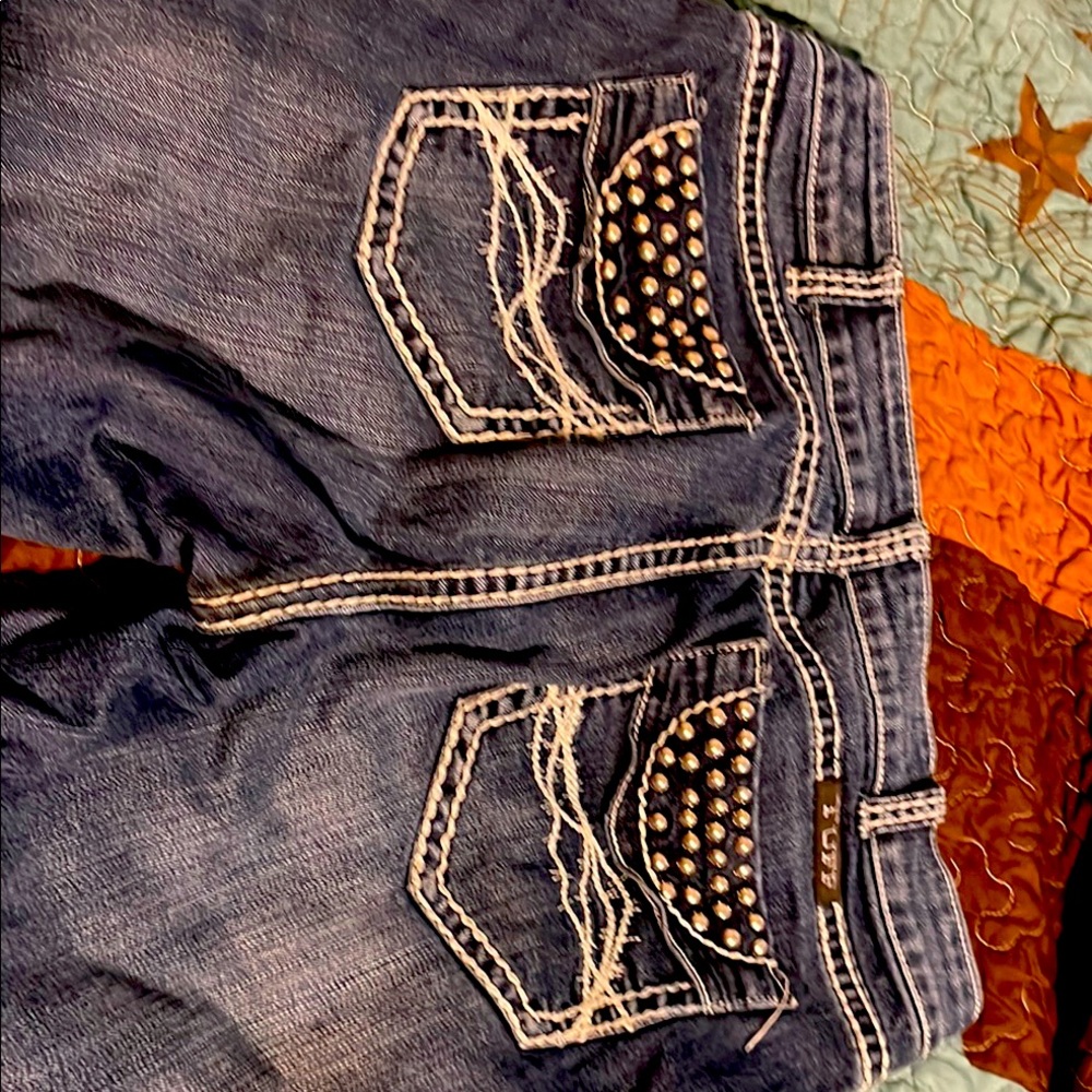 Cowgirl Tuff Boot Cut Blue Jeans with Intricate Stitching